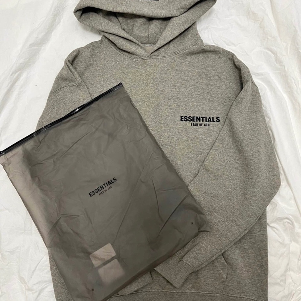 Brand new essentials hoodie comes with dust bag
